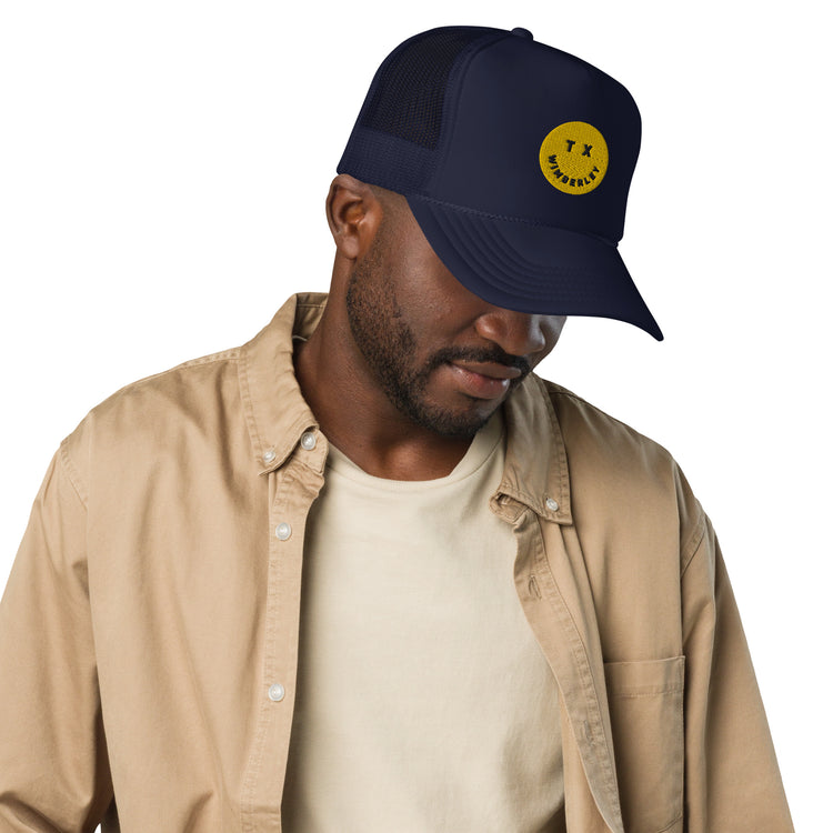 Wimberley Smile Foam trucker hat, Navy/Yellow, angled view