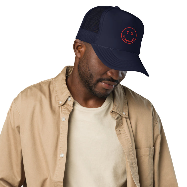 Wimberley Smile Foam trucker hat, Navy/Red, angled view